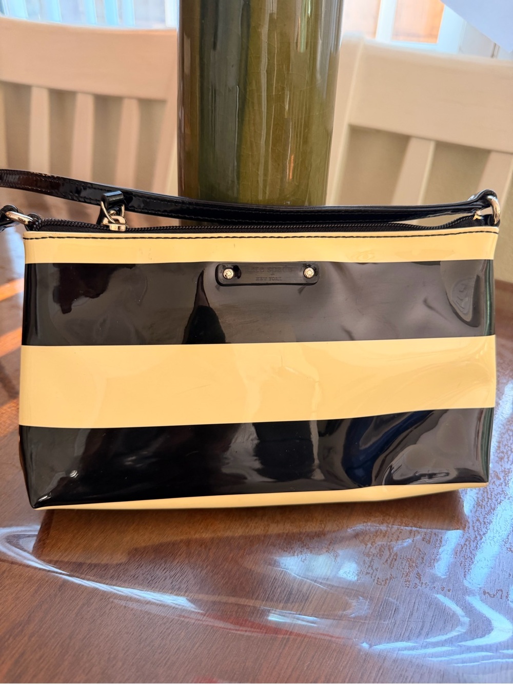 Retro style Kate Spade stripe handbag.